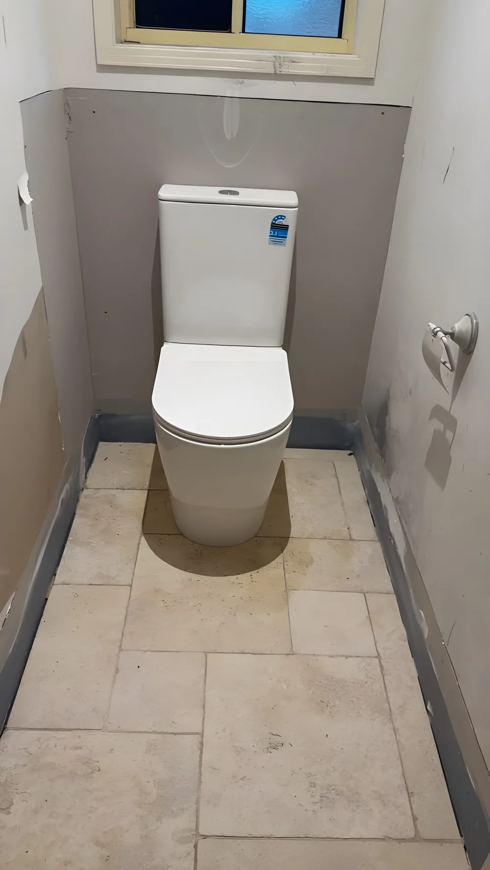 New toilet fitted off in a renovated bathroom